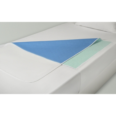 Washable mattress overlay with tuck-in flaps